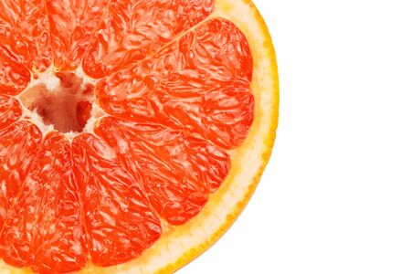 Slice a fresh juicy red round grapefruitの写真素材