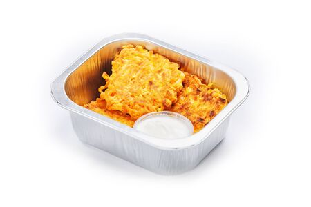 Portion of food in the container isolated on whiteの写真素材