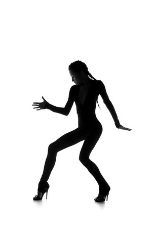 Sexy young dancer isolated on white studio shotの写真素材