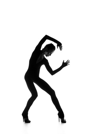 Sexy young dancer isolated on white studio shotの写真素材
