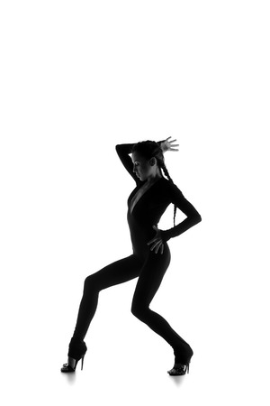 Sexy young dancer isolated on white studio shotの写真素材