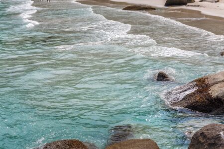 Sea with clear and transparent water on sand