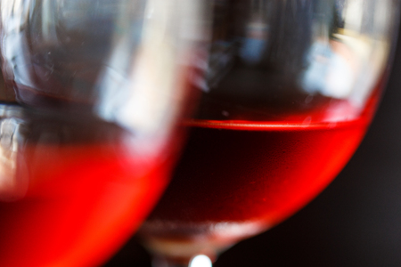 Macro view of a red wine in a glassの写真素材