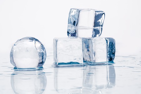 Ice cubes and balls on a wet table studio shotの写真素材
