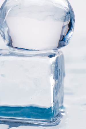 Ice cubes and balls on a wet table studio shotの写真素材