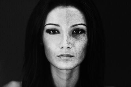 Girl with young and old face studio shotの写真素材