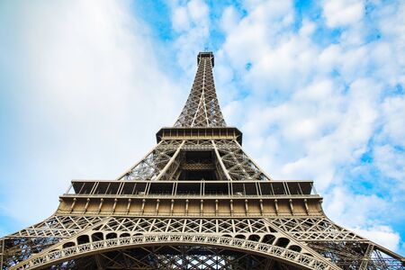 Eiffel Tower in Paris on the blue sky backgroundの写真素材