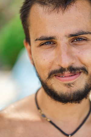 Portrait of a handsome man with black moustache and beardの写真素材