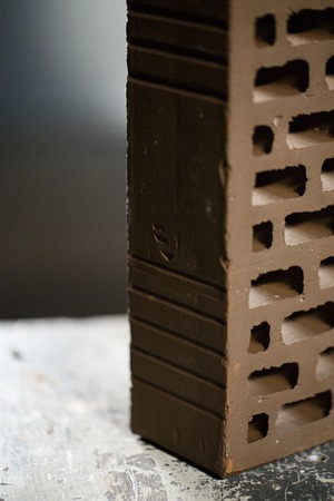 Closeup view of bricks with holes studio shotの写真素材