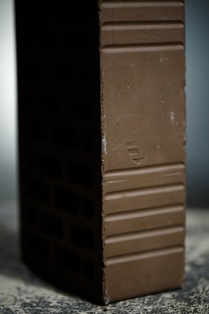 Closeup view of bricks with holes studio shotの写真素材