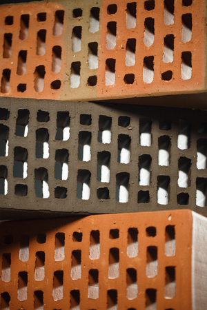 Closeup view of bricks with holes studio shot