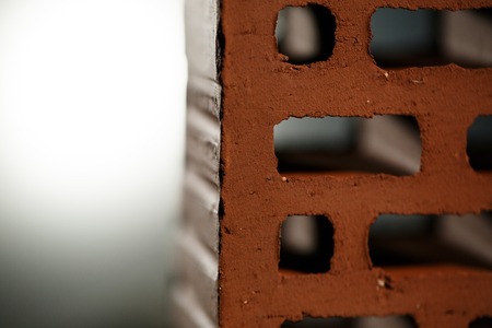Closeup view of bricks with holes studio shotの写真素材