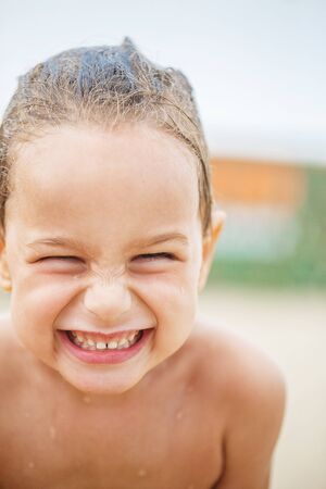 Beautiful kid on the beachの写真素材