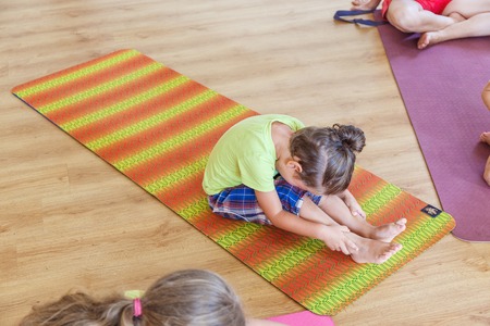 Little boy on a yoga classの写真素材