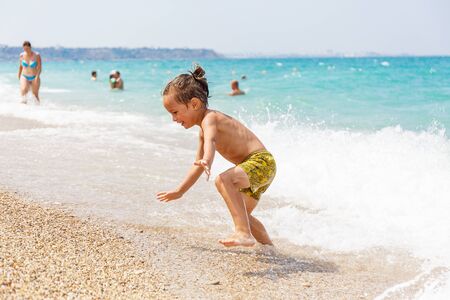 Beautiful boy and the seaの写真素材