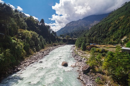 Pure mountain river in the mountains of Nepalの写真素材