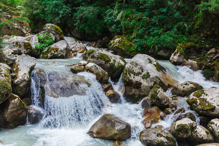 Pure mountain river in the mountains of Nepalの写真素材
