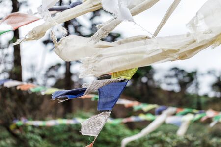 Colorful flags in the mountains of Nepalの写真素材