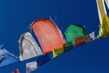 Colorful flags in the mountains of Nepalの写真素材