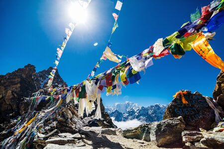 Colorful flags in the mountains of Nepalの写真素材