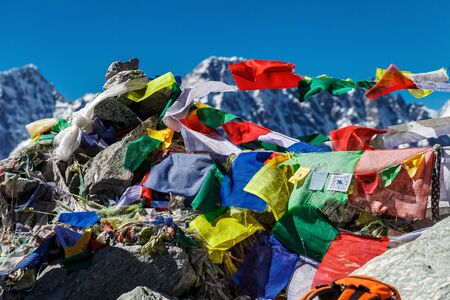 Colorful flags in the mountains of Nepalの写真素材