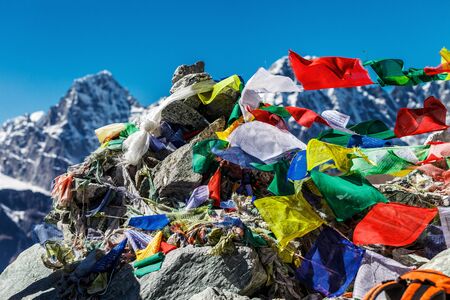 Colorful flags in the mountains of Nepalの写真素材