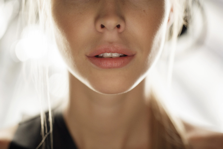 Beauty model face in light studio shotの写真素材
