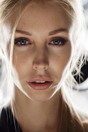 Beauty model face in light studio shotの写真素材