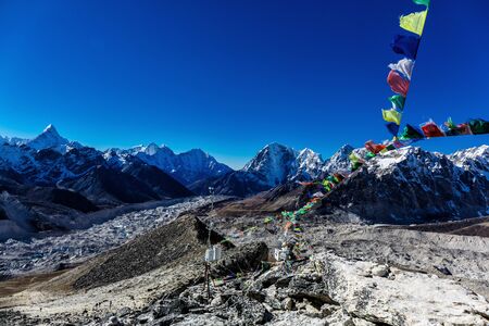 Colorful flags in the mountains of Nepalの写真素材