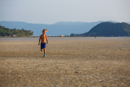 Little boy on the beachの写真素材