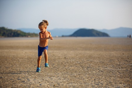 Little boy on the beachの写真素材