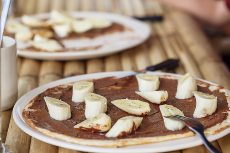 pancake with chocolate and bananaの写真素材