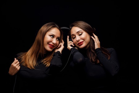 Beautiful girls twins-djの写真素材