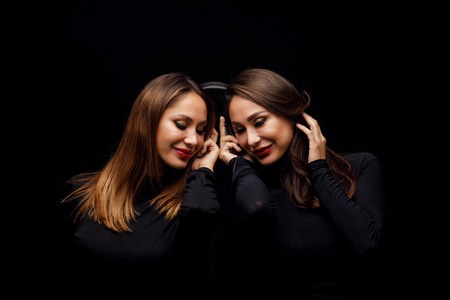 Beautiful girls twins-djの写真素材