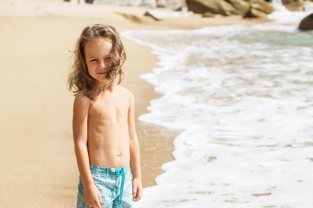 little boy in the sea in Thailandの写真素材