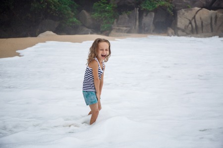 little boy in the sea in Thailandの写真素材