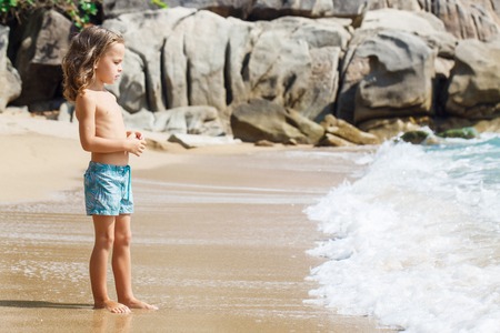 little boy in the sea in Thailandの写真素材