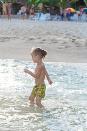 little boy in the sea in Thailandの写真素材