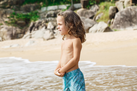 little boy in the sea in Thailandの写真素材