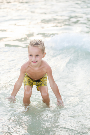 little boy in the sea in Thailandの写真素材