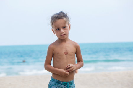 Portrait of a  boy in sunlightの写真素材