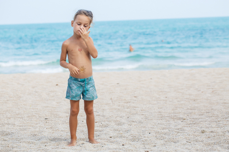Portrait of a  boy in sunlightの写真素材