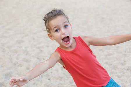 beautiful baby boy is having fun on the beachの写真素材