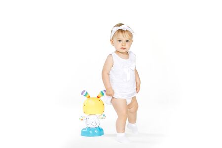 beautiful little girl all in white clothesの写真素材