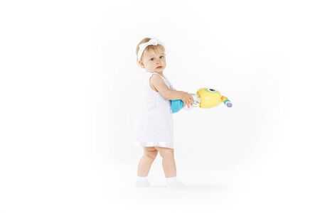 beautiful little girl all in white clothesの写真素材