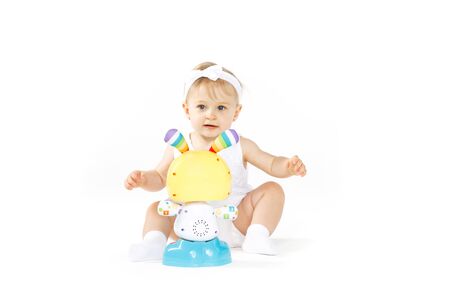 beautiful little girl all in white clothesの写真素材