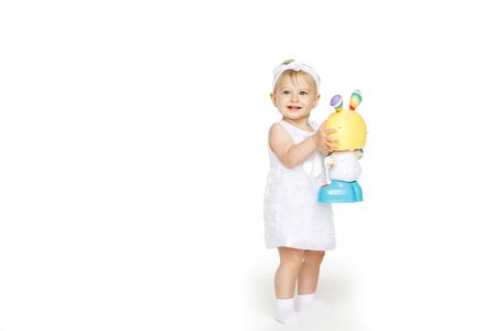 beautiful little girl all in white clothesの写真素材