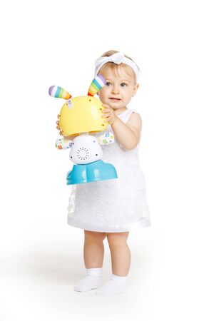 beautiful little girl all in white clothesの写真素材