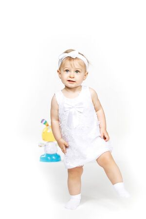 beautiful little girl all in white clothesの写真素材