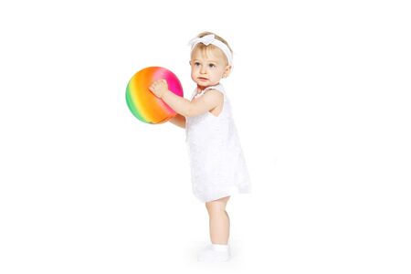 beautiful little girl all in white clothesの写真素材